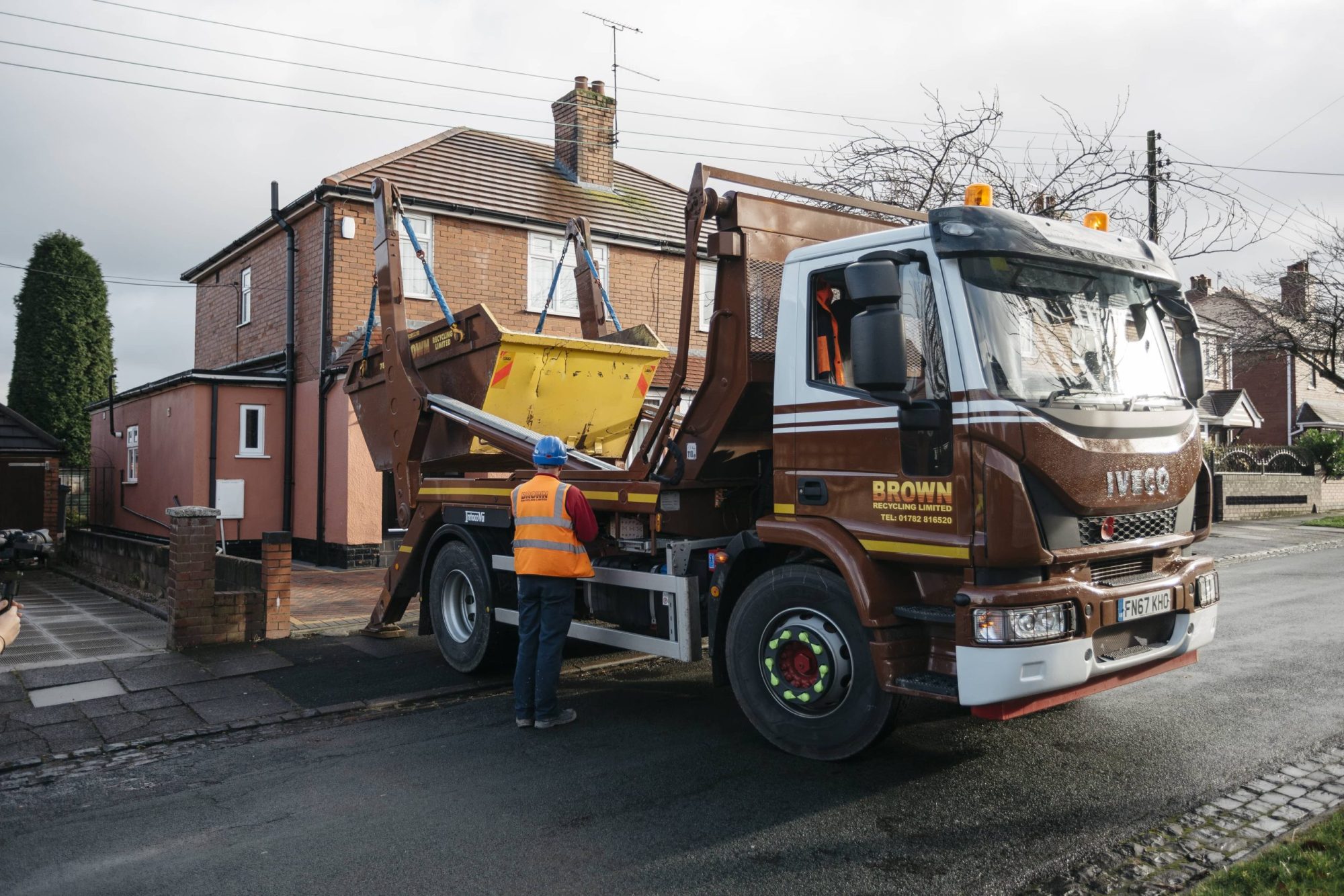 Brown Recycling truck builders skips hire