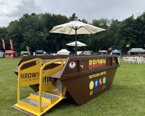 skip seat at stone food festival - Brown recycling
