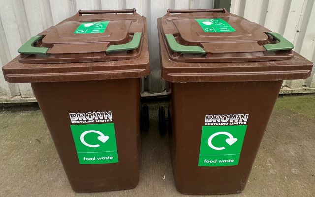 brown food waste bins with green labels - Brown recycling