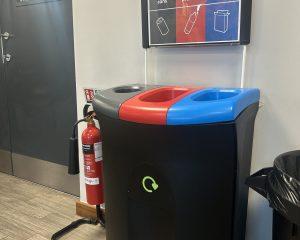 a bin with three seperate sections, red, blue and grey - solidor case study