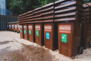 Brown Recycling containers labelled up for food waste and mixed glass collections. Part of our Source Segregated Recycling (SSR) rollout for a customer.